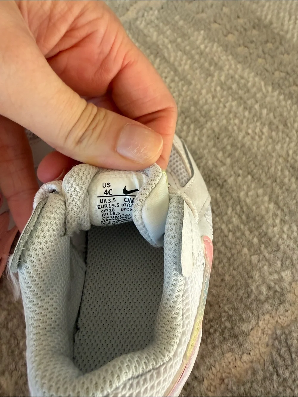 Nike Kids White Sneakers with Pink and Pastel Accents